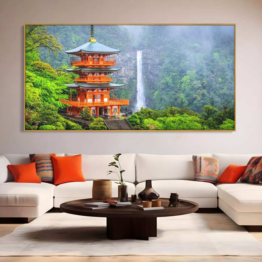 Tablou canvas cu tablou canvas cu pagoda si cascada, in rama de aluminiu auriu, pe perete intr-un living